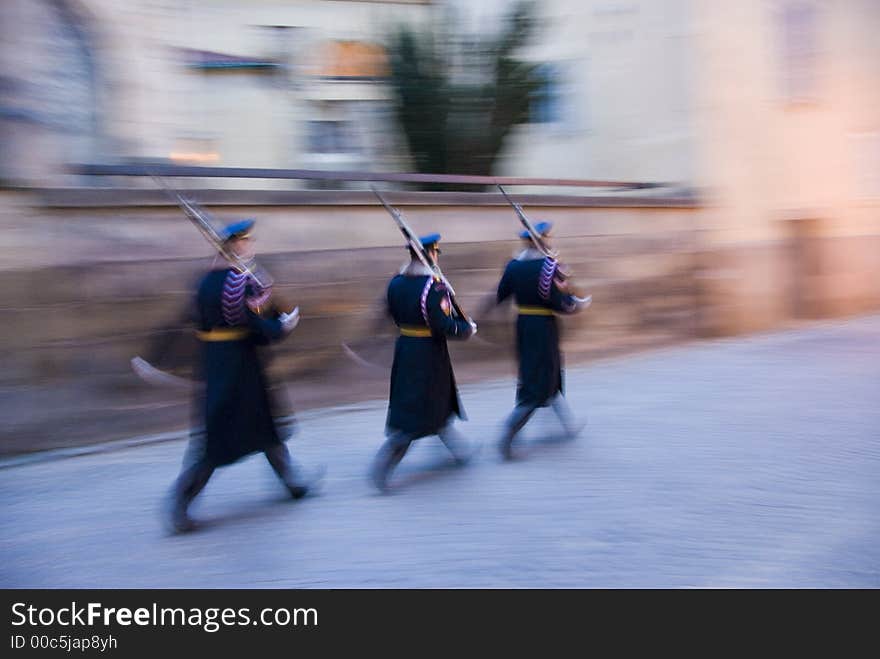 Czech soldiers marching while changing guards in Prague; motion blur