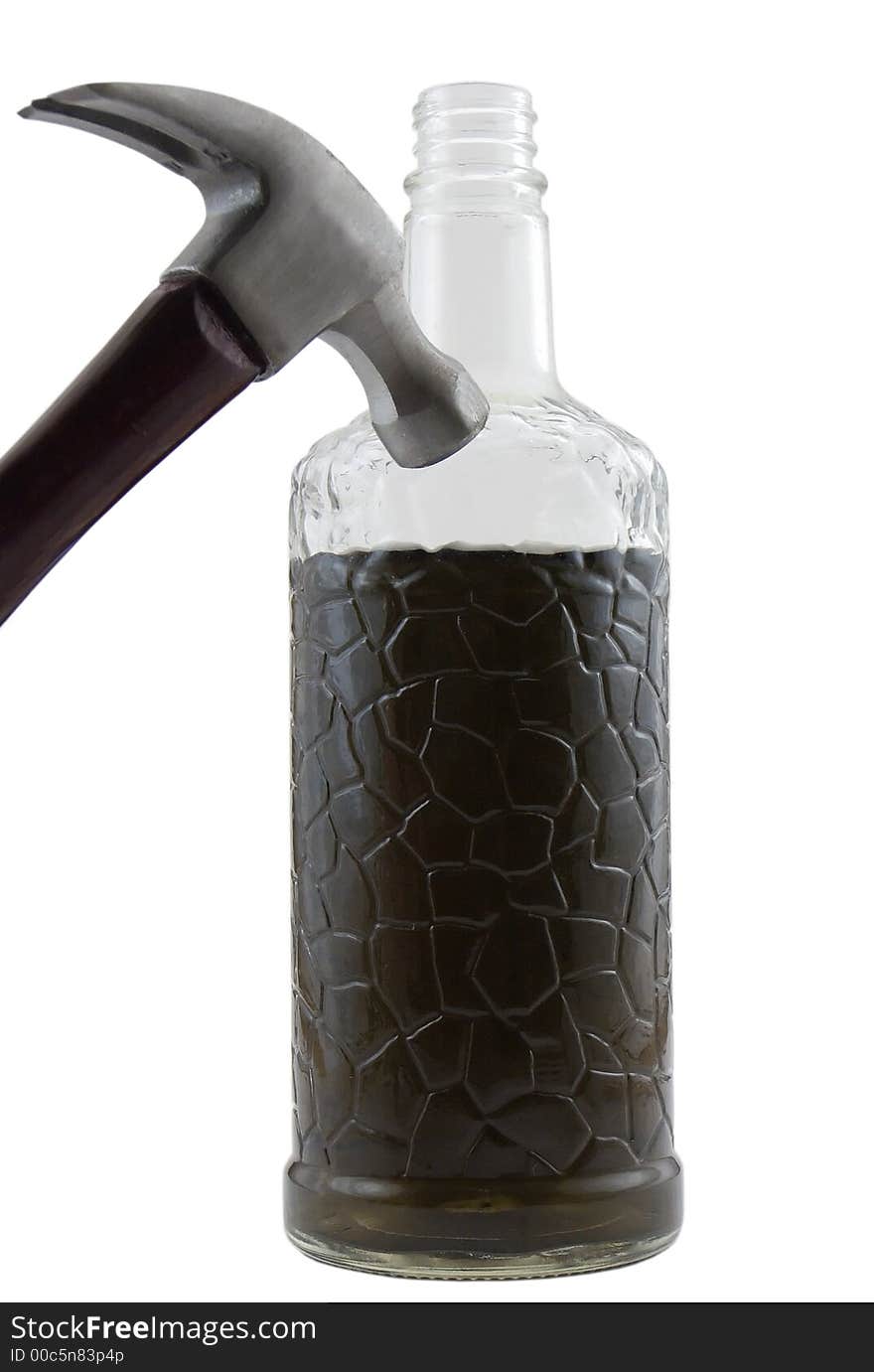 Photo of a cracked glass bottle with a hammer striking it, isolated on white. Photo of a cracked glass bottle with a hammer striking it, isolated on white