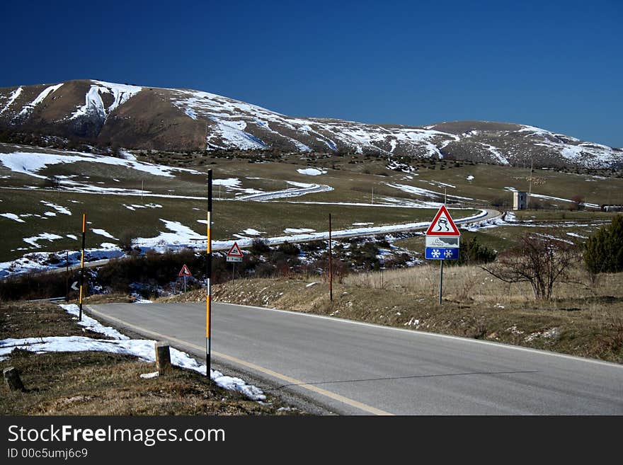 Mountain road panorama captured near Macereto - Visso - Italy. Mountain road panorama captured near Macereto - Visso - Italy