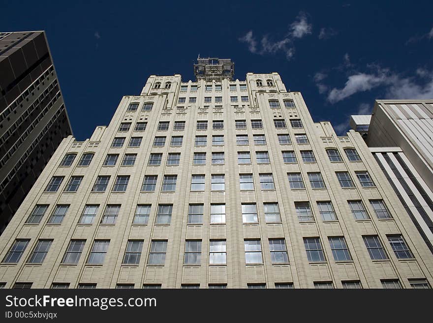 Looking up at tall building