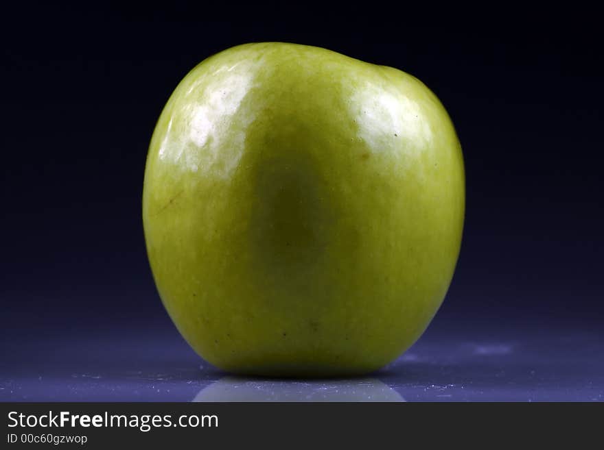 Green apple with black bottom