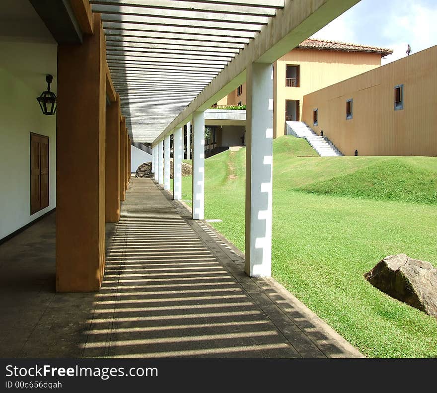 Hotel walkway to rooms and garden