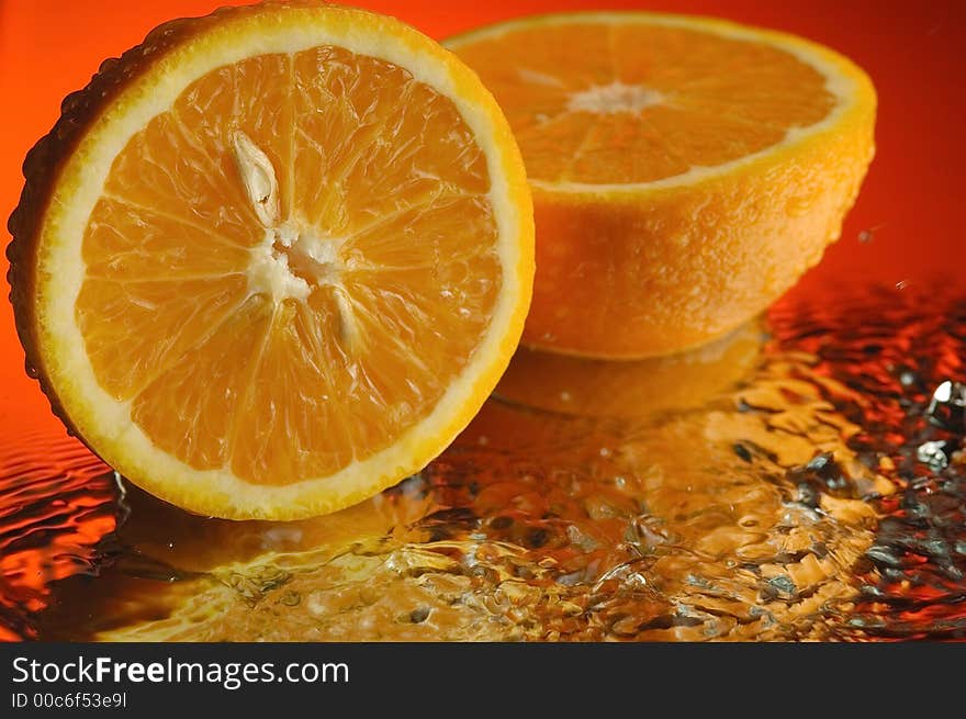 Orange and water with ripples. Orange and water with ripples