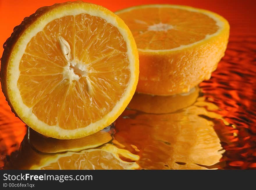 Orange and water with ripples. Orange and water with ripples