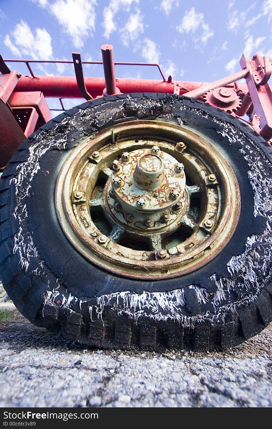 Verticle Old Flat Shredded Tractor Tire. Verticle Old Flat Shredded Tractor Tire