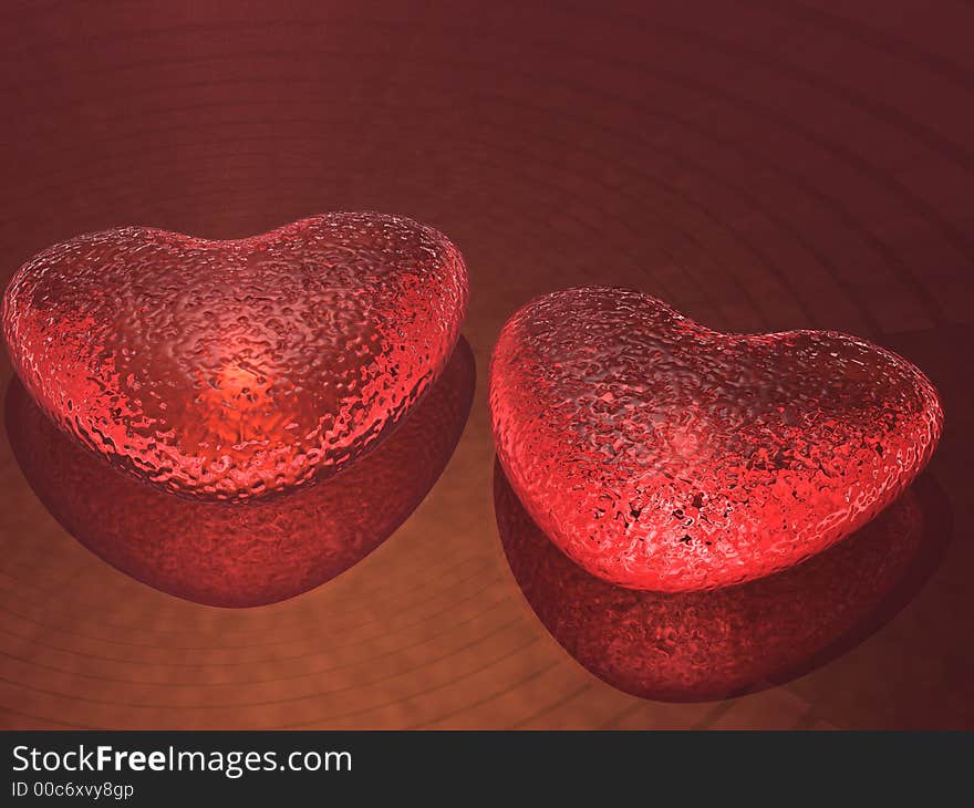 Two glass hearts with bright red illumination