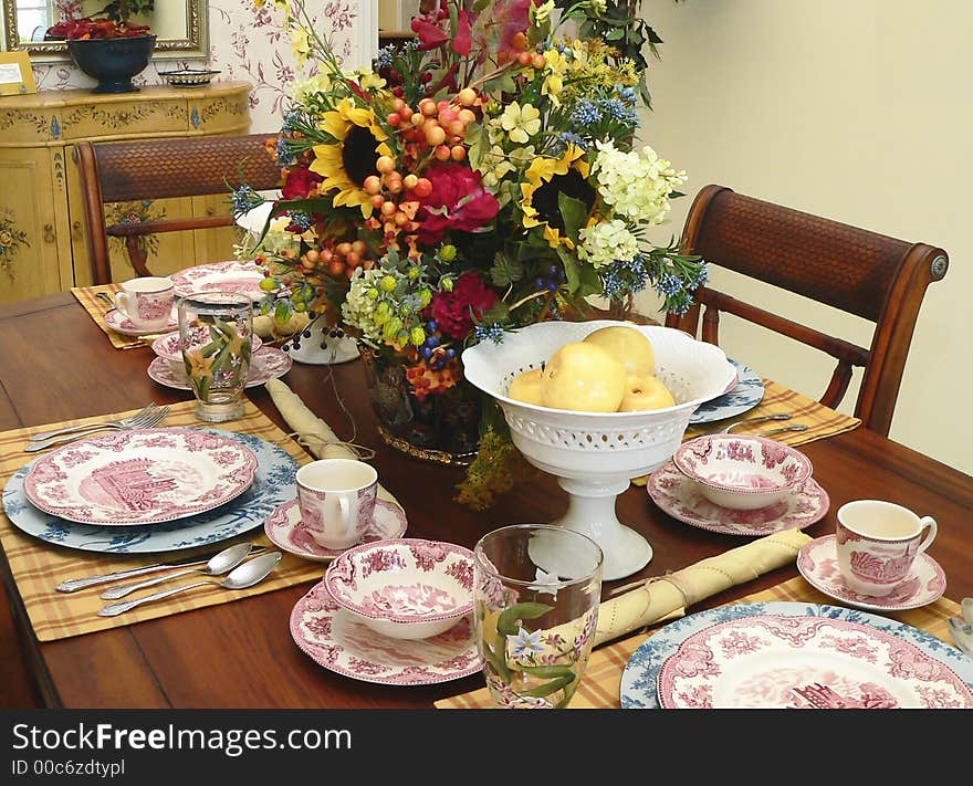 Luxurious table setting for four. Luxurious table setting for four