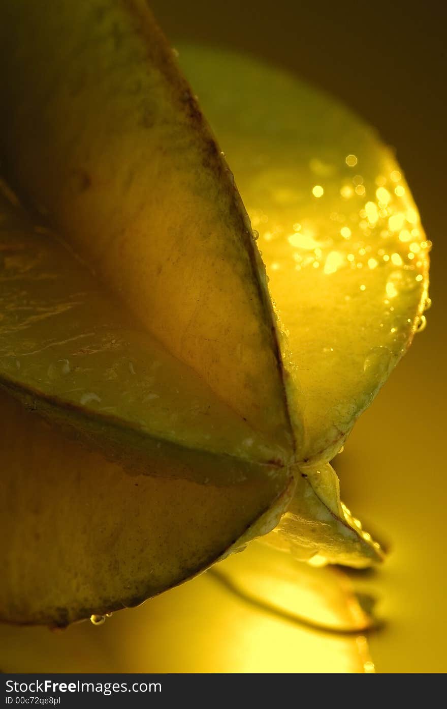 Carambola, water and mirror surface. Carambola, water and mirror surface