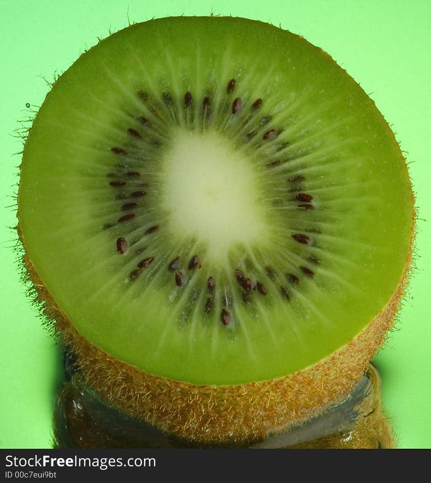 Kiwi, water and mirror surface. Kiwi, water and mirror surface