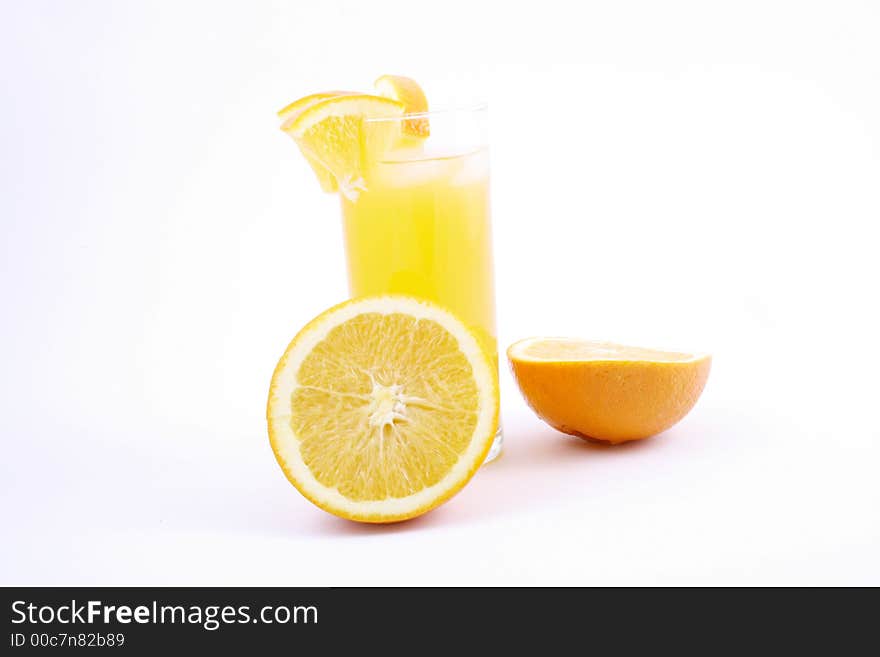 Orange juice and half-cut oranges isolated on white