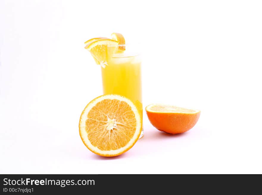 Orange juice and half-cut oranges isolated on white