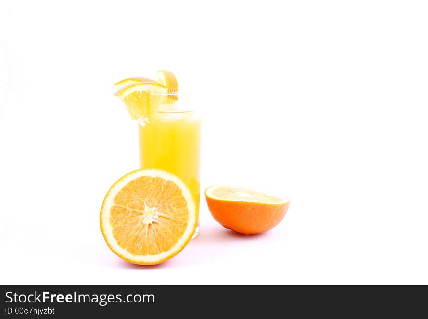 Orange juice and half-cut oranges isolated on white