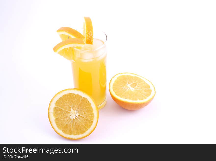 Orange juice and half-cut oranges isolated on white