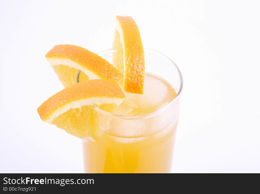 Orange juice and half-cut oranges isolated on white