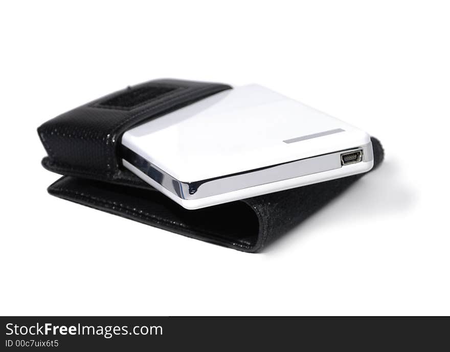 Disk drive with leather case over white background. Disk drive with leather case over white background