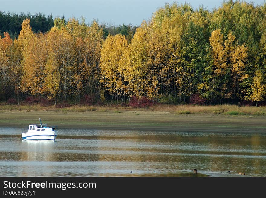 Beautiful lake scene on barrier Liptovska Mara with boat, slovakia. Beautiful lake scene on barrier Liptovska Mara with boat, slovakia