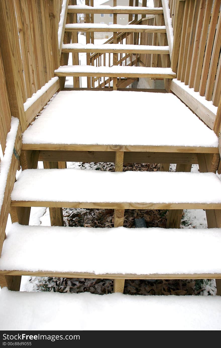 Stair covered with white snow all over