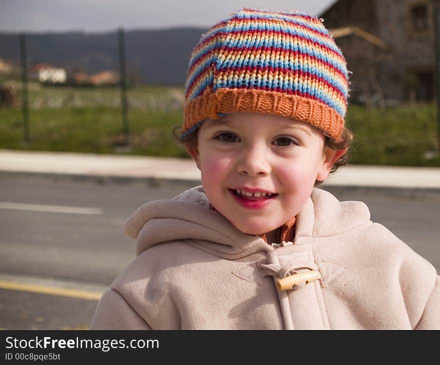 Cute little boy smiling at camera