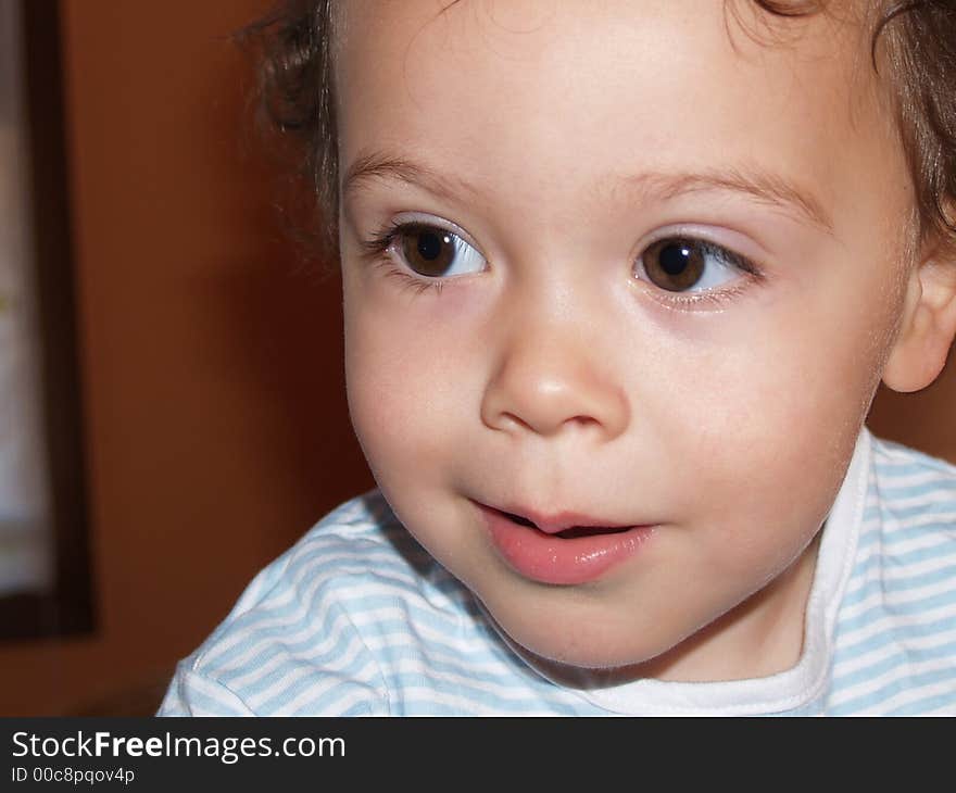 Cute little boy smiling at camera