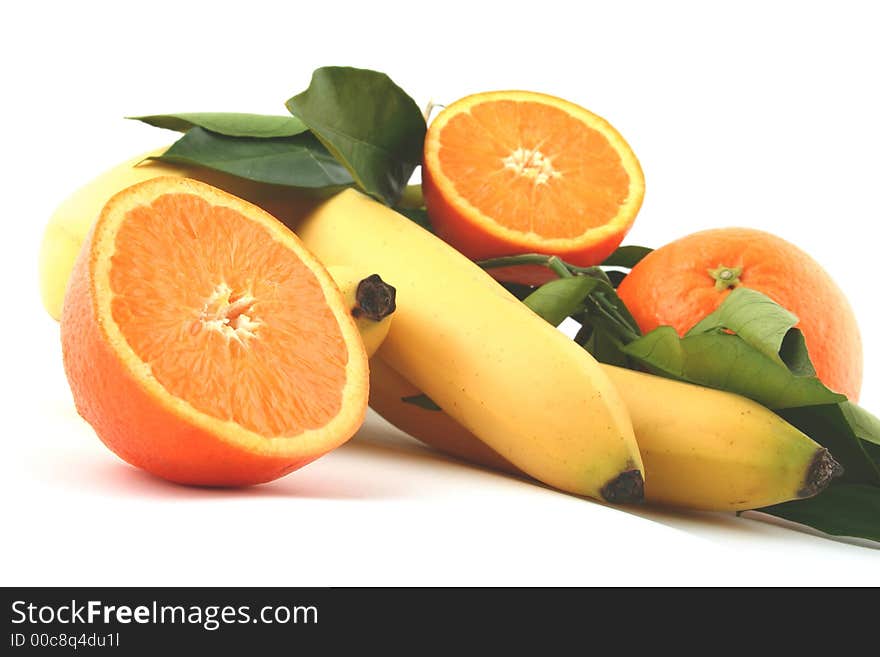 Fresh bananas and orange on white background (fruits, food, vitamin)