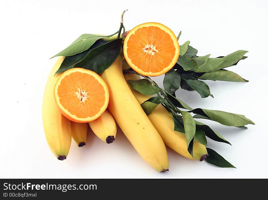 Fresh bananas and orange on white background (fruits, food, vitamin)