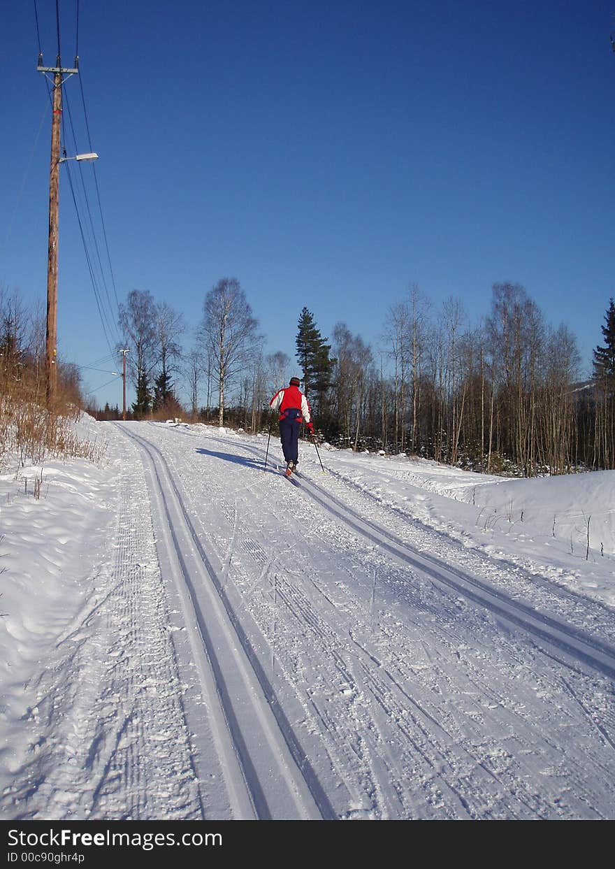 Man skiing on a fine day