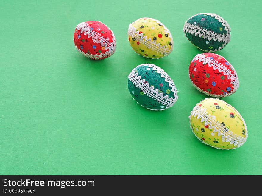 Six easter eggs on the green background - the symbol of spring. Six easter eggs on the green background - the symbol of spring