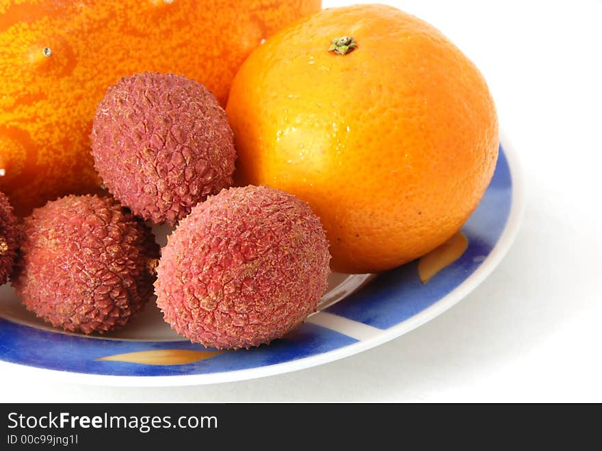 Fresh tropical fruit on a plate. Fresh tropical fruit on a plate