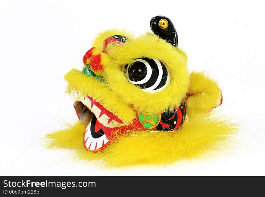 Lion head isolated over white. This head is used for the Chinese lion dance.