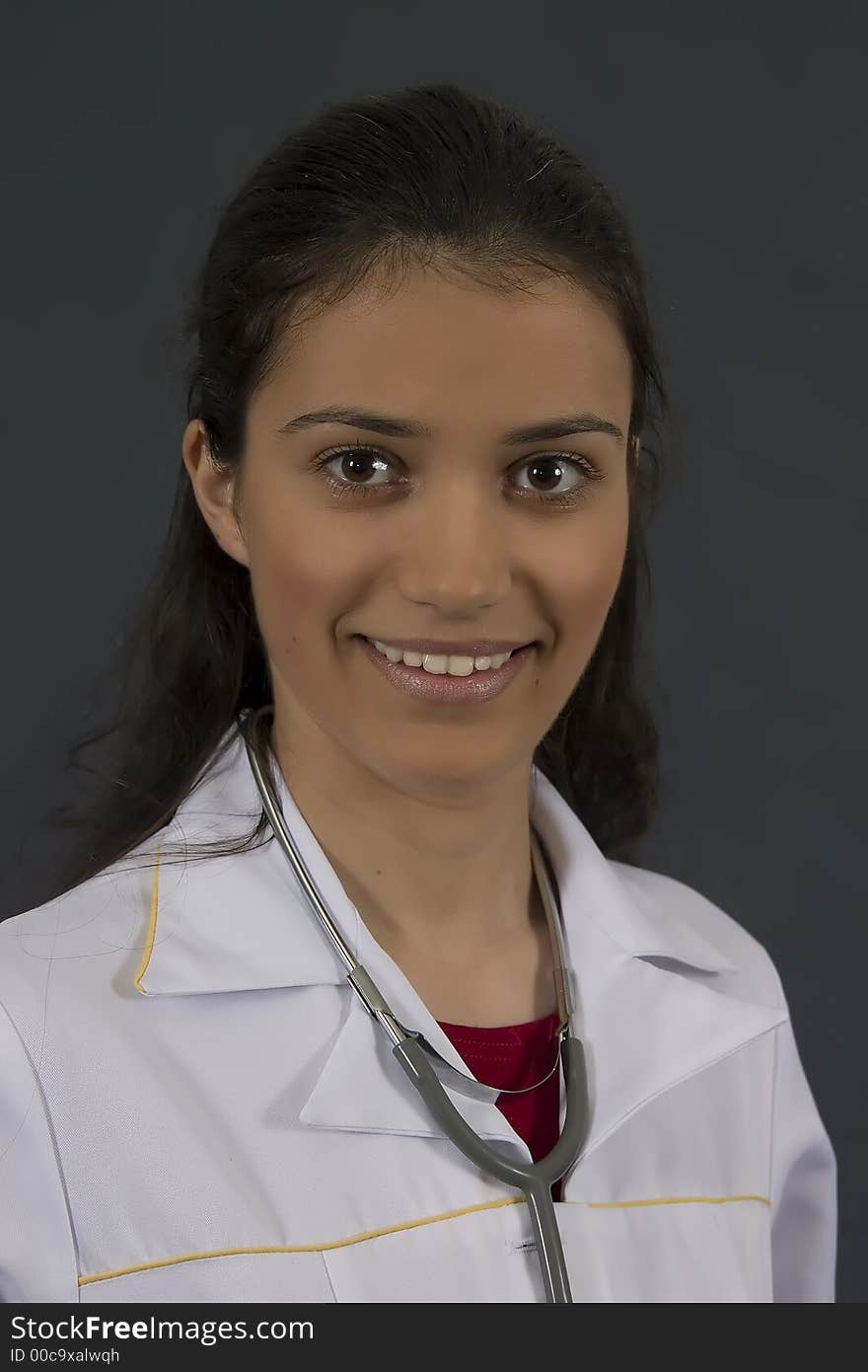 Beautiful young doctor with stethoscope