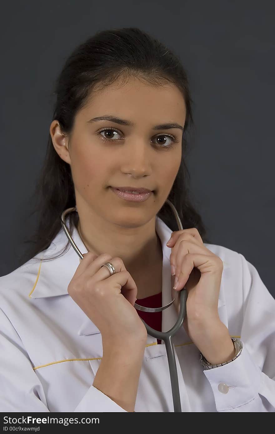 Beautiful young doctor with stethoscope