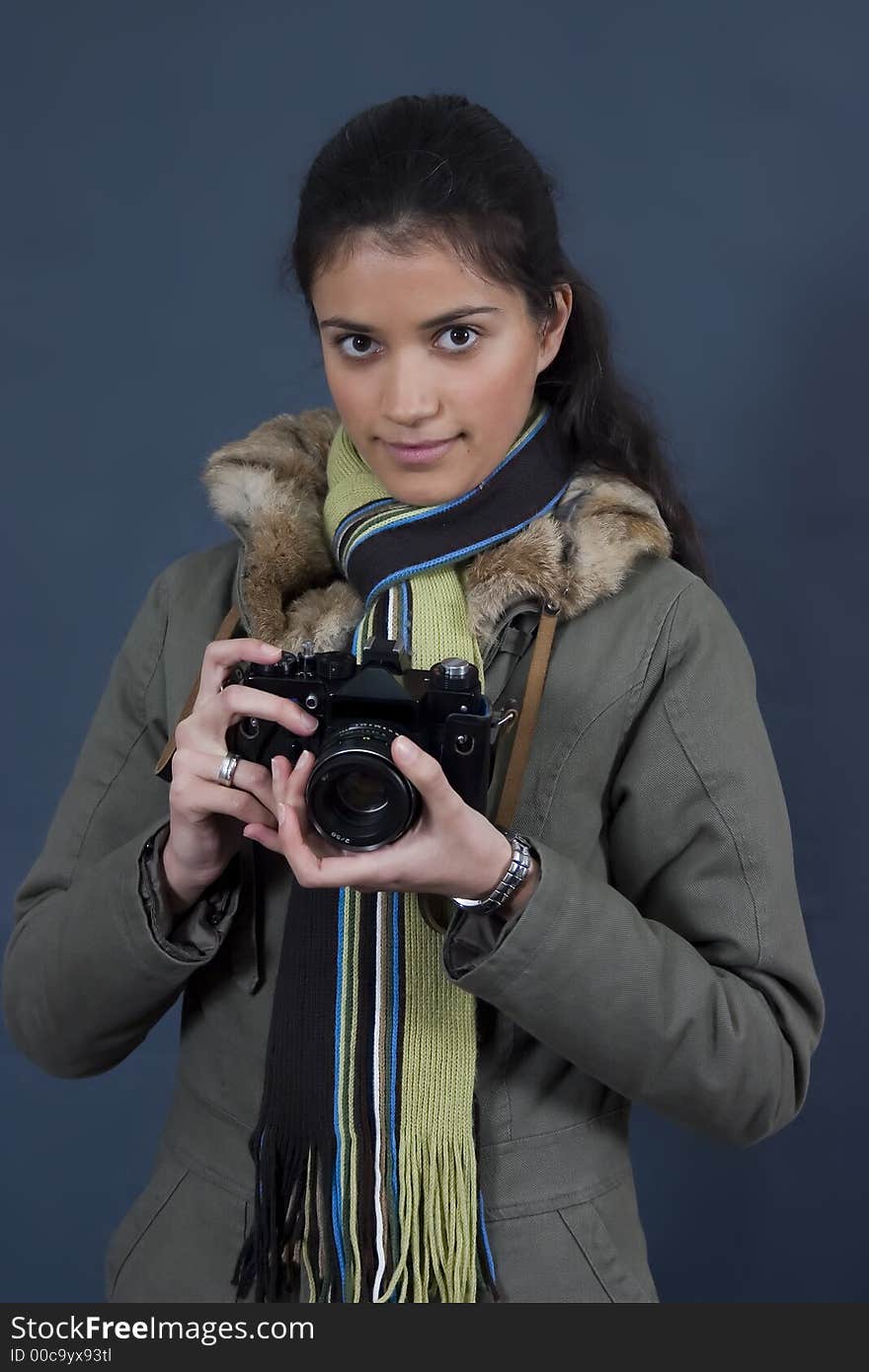 Young girl with camera