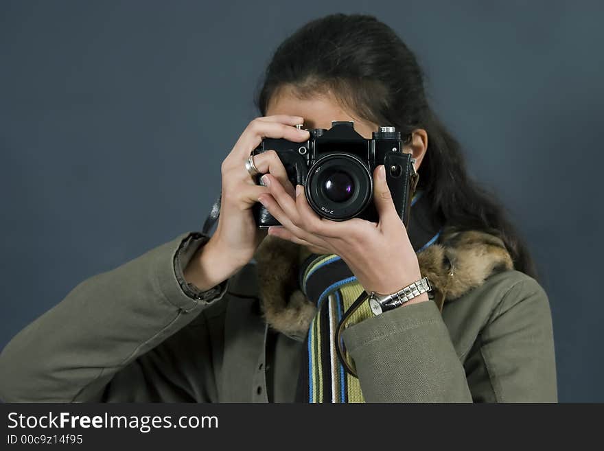 Young girl with camera