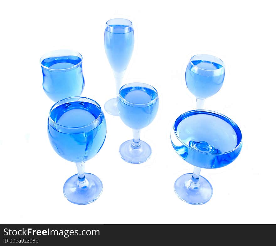 Glasses with a blue liquid