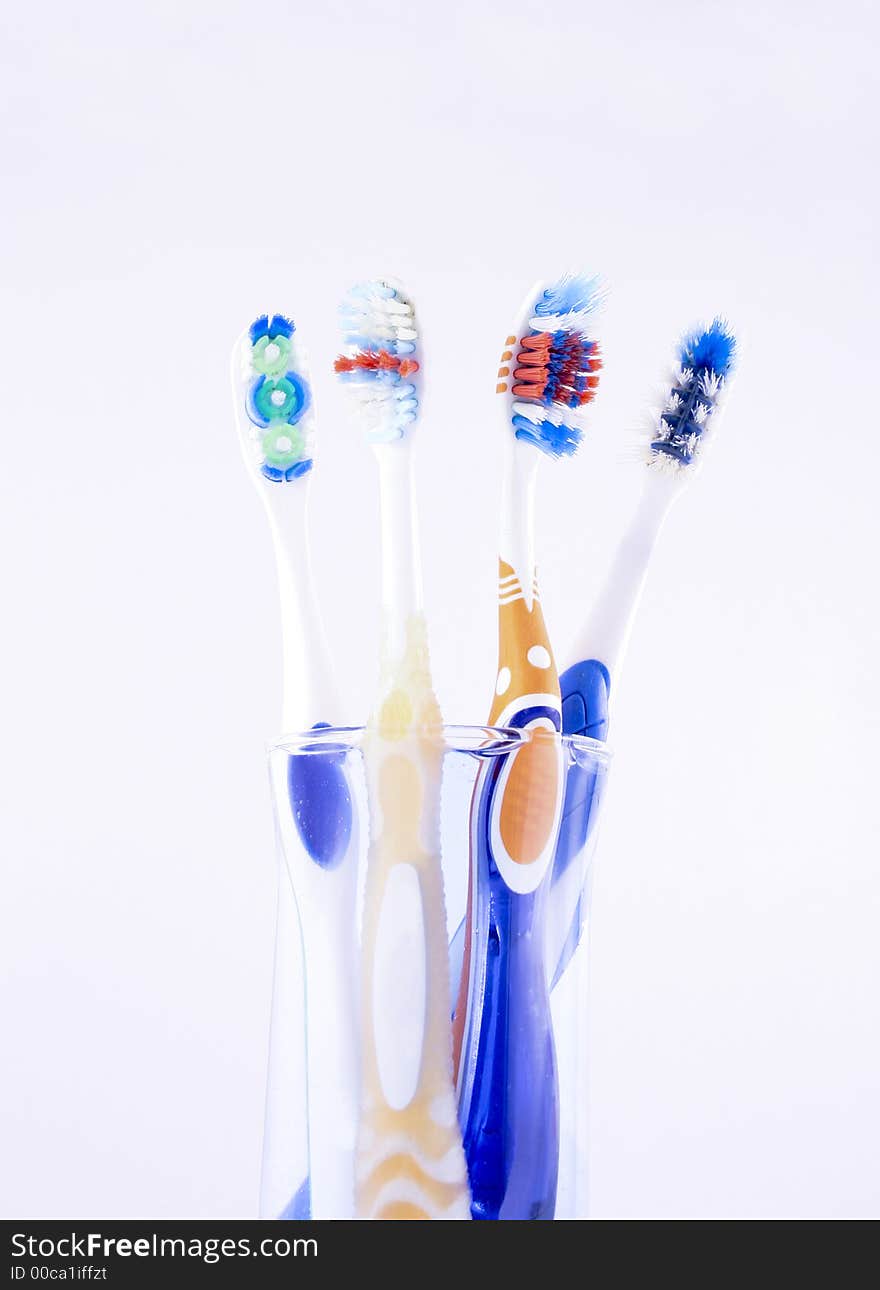 Toothbrushes on a glass