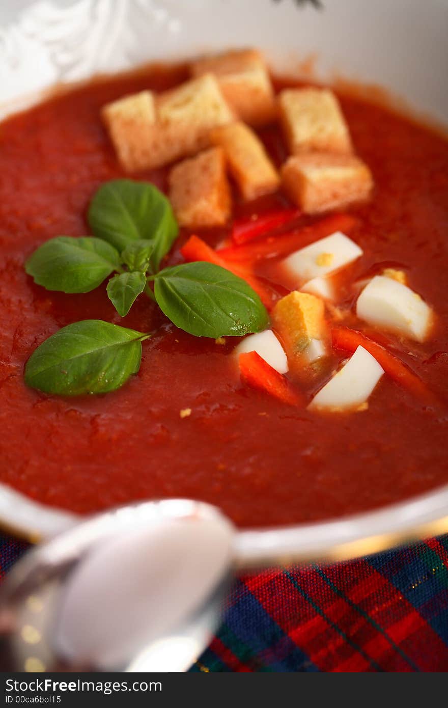 Vegetables soup with egg and baguette