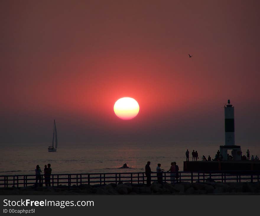 Sun setting into Lake Michigan's water. Sun setting into Lake Michigan's water