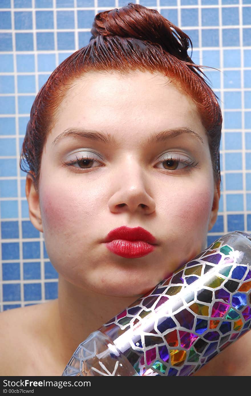 Girl with dyeing and colored bottle. Girl with dyeing and colored bottle