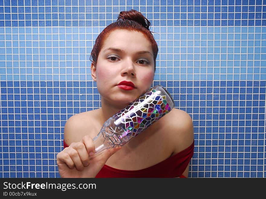 Girl with dyeing and colored bottle. Girl with dyeing and colored bottle