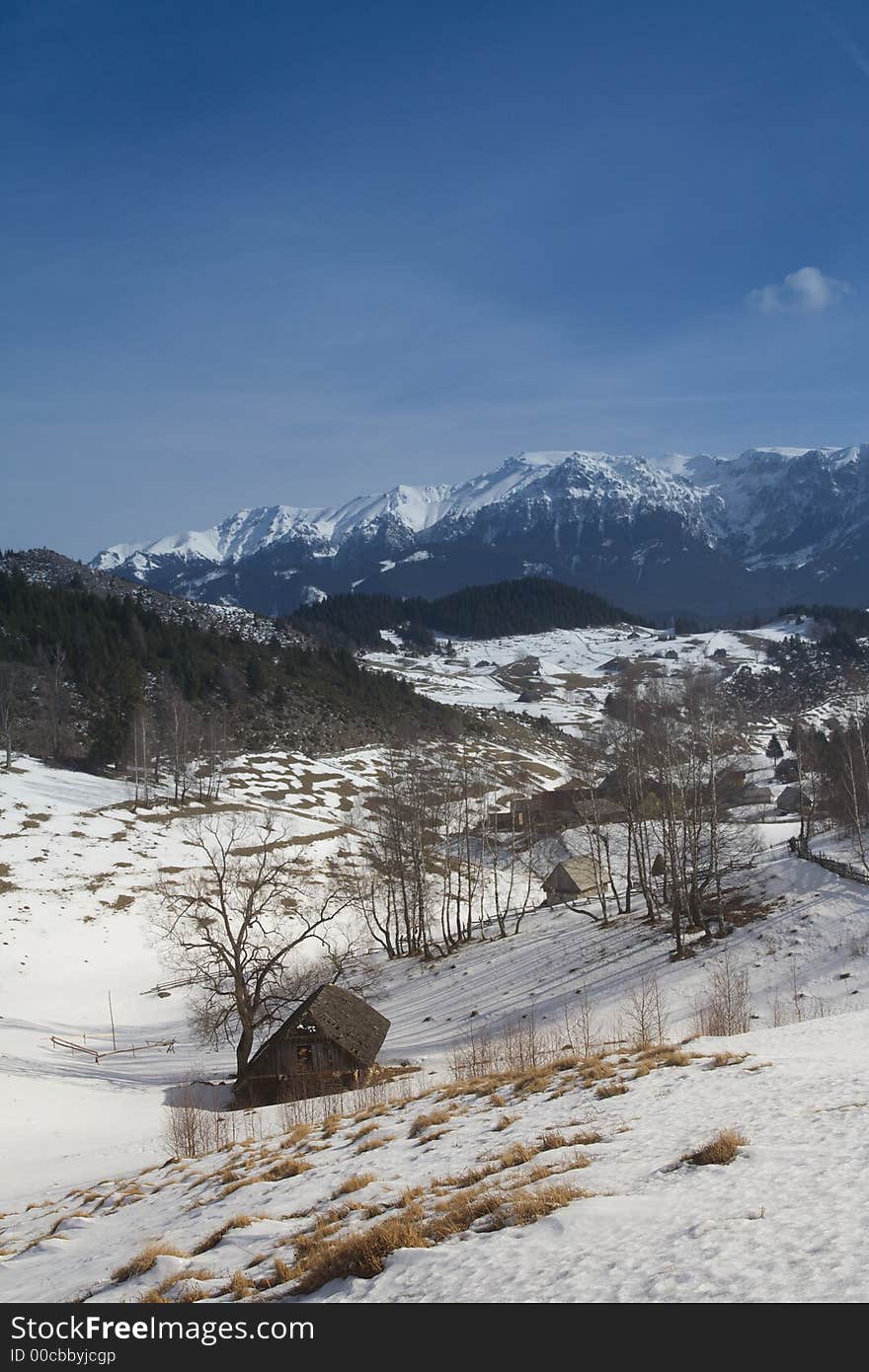 Winter landscape with old houses