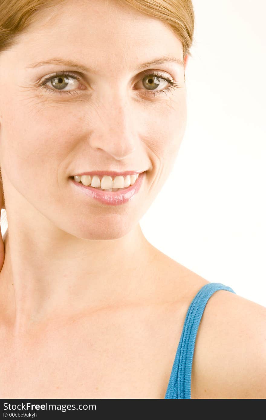 A portrait of a young woman against a plain background.