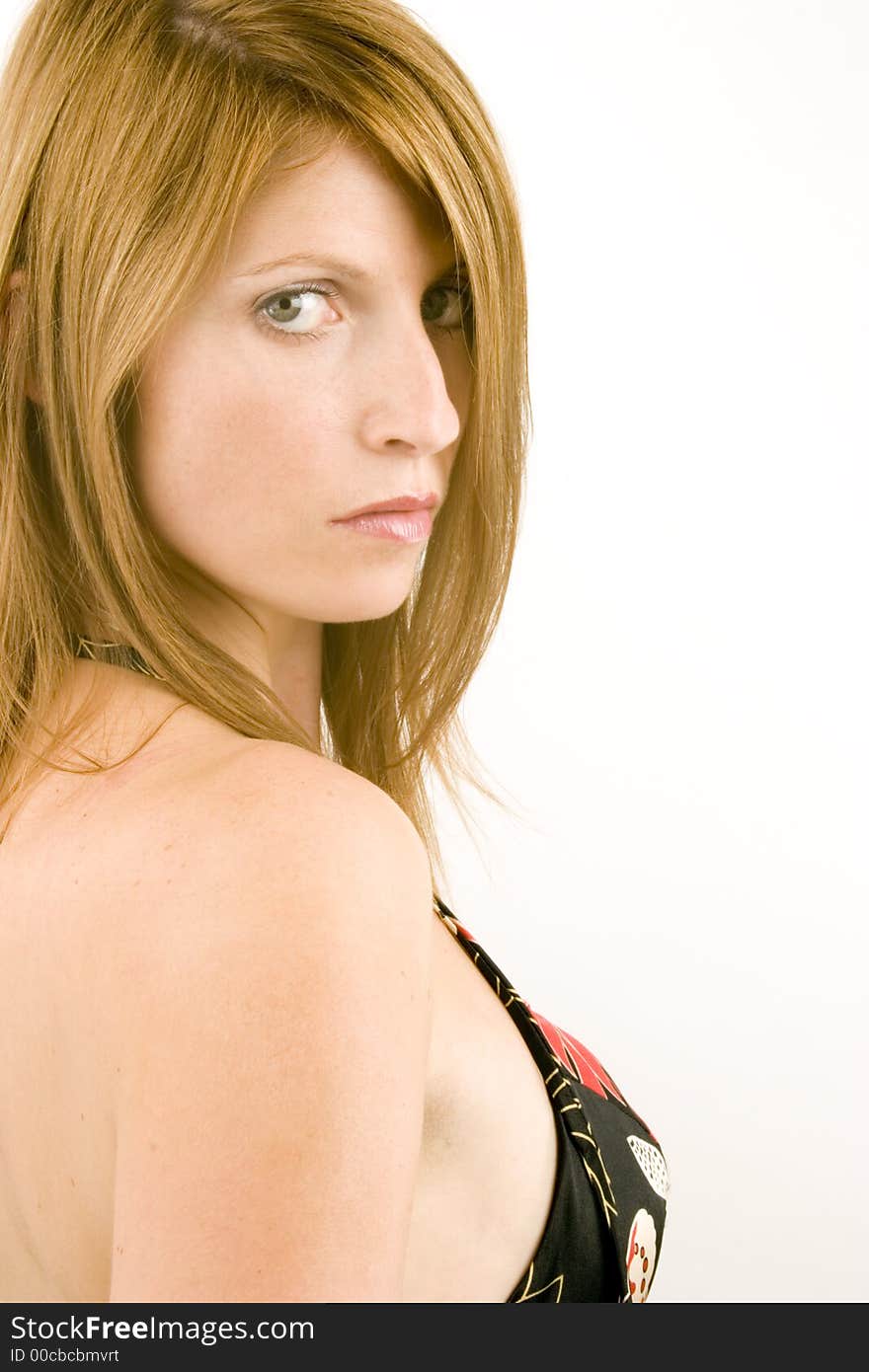 A portrait of a young woman against a plain background.