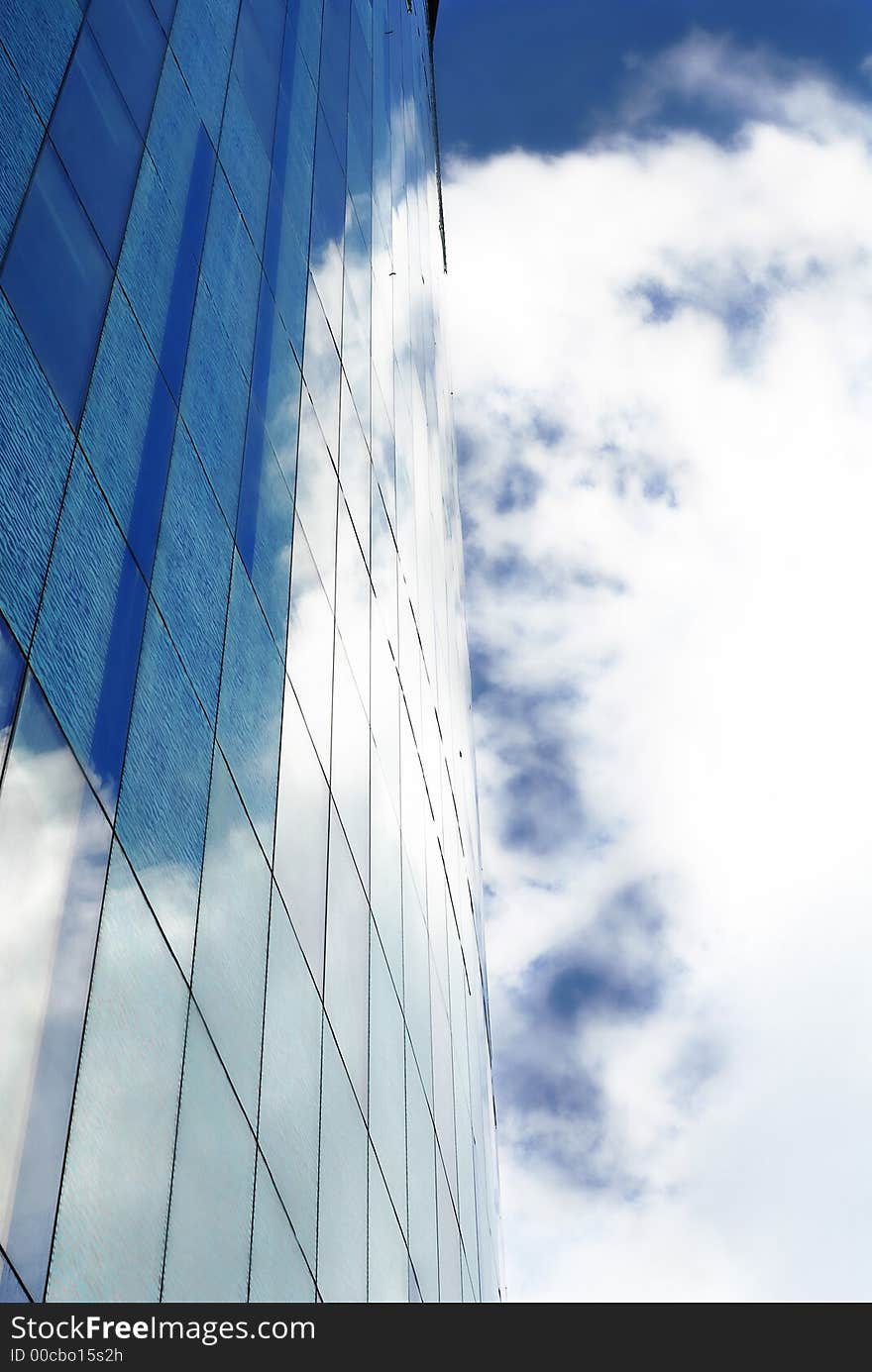 Modern Majestic Skyscraper with reflections of clouds