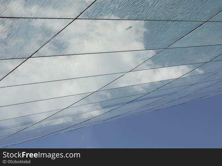 Modern Majestic Skyscraper with reflections of clouds