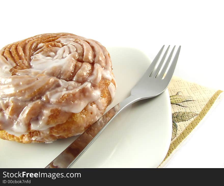 Donut on white plate isoleted on white background