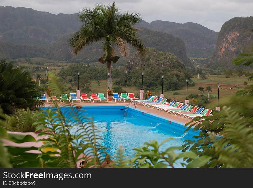 Swimming pool surrounded by beautiful mountainscape in Vinales, Cuba. Swimming pool surrounded by beautiful mountainscape in Vinales, Cuba