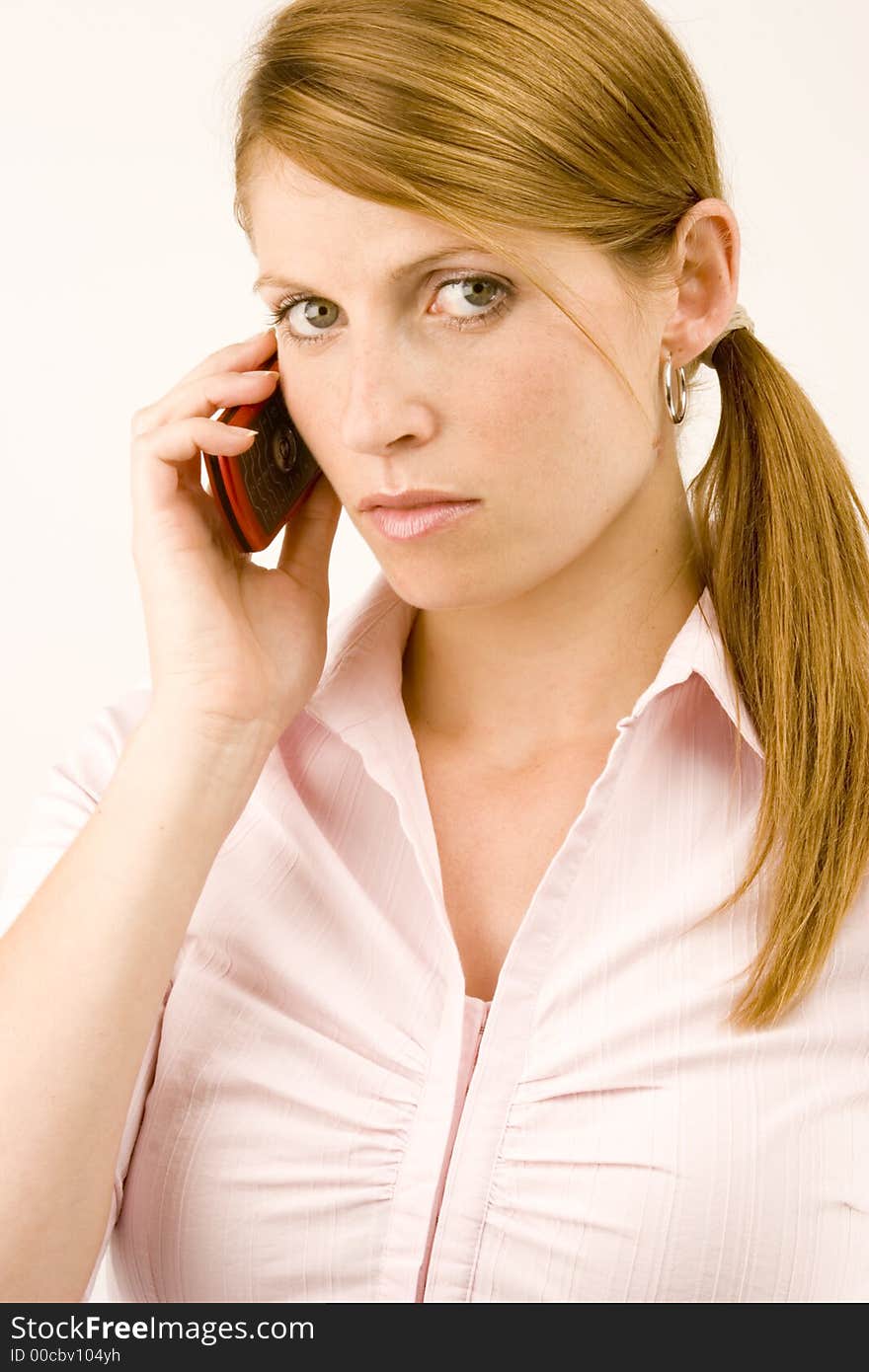 A Woman talking on her mobile phone. A Woman talking on her mobile phone.