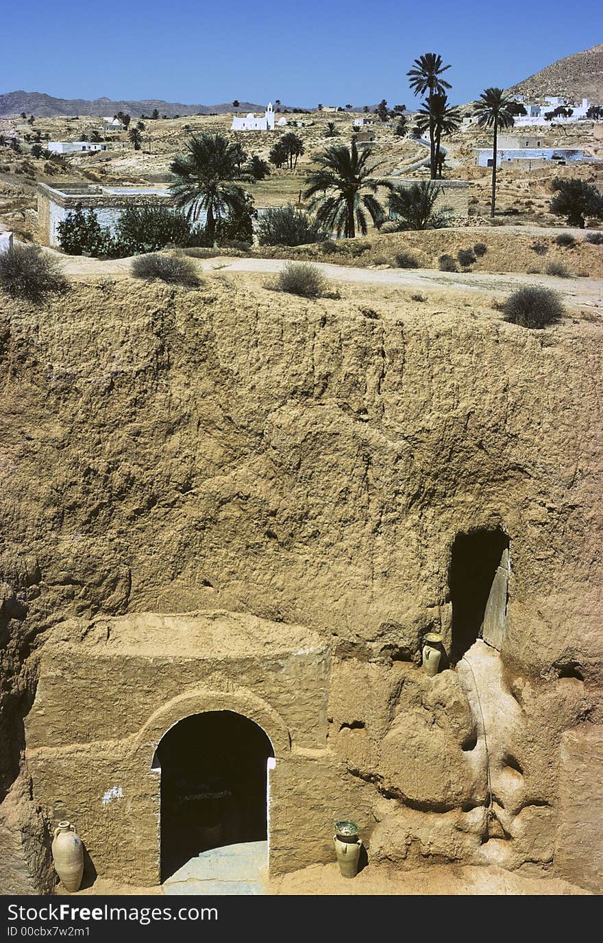 Picturesque Tunisian village of Matmatas that are old troglodyte houses excavated in the rock, getting fresh homes in summer and warm in winter. Picturesque Tunisian village of Matmatas that are old troglodyte houses excavated in the rock, getting fresh homes in summer and warm in winter.