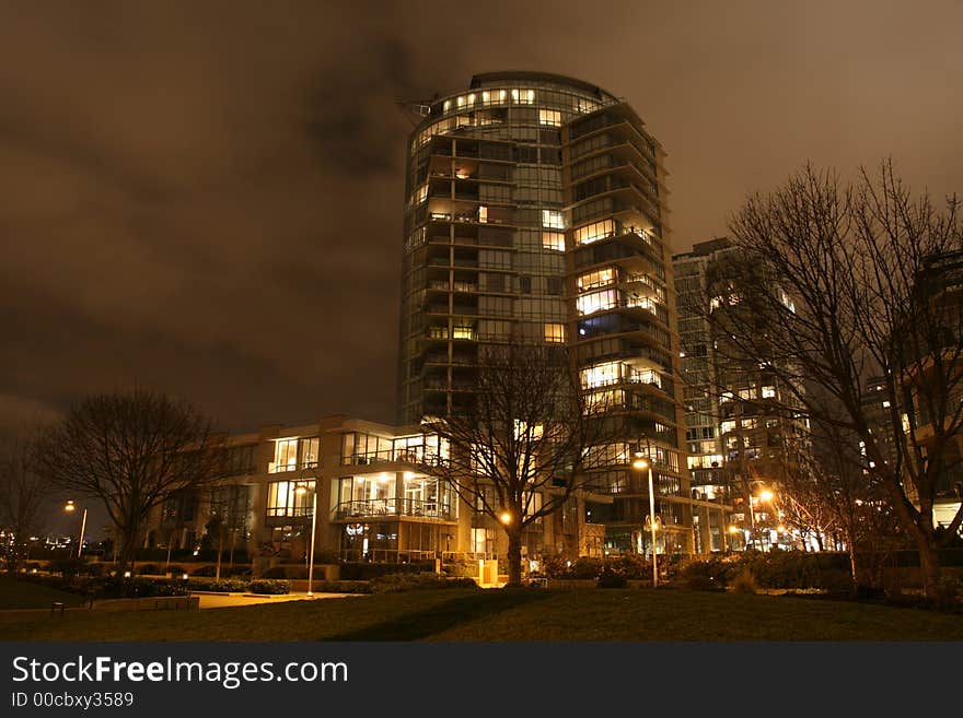 High end town homes with high rise condominium development in the background. High end town homes with high rise condominium development in the background.