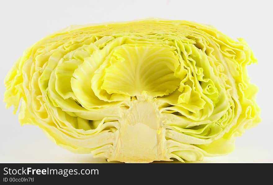 Half cabbage isolated on white